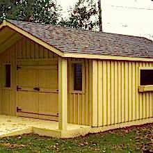14 x 20 high board and batten with a 4 foot gable porch.